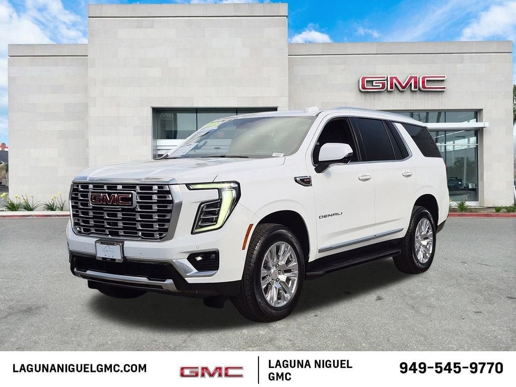 2025 GMC Yukon Denali in Summit White — front three-quarter view