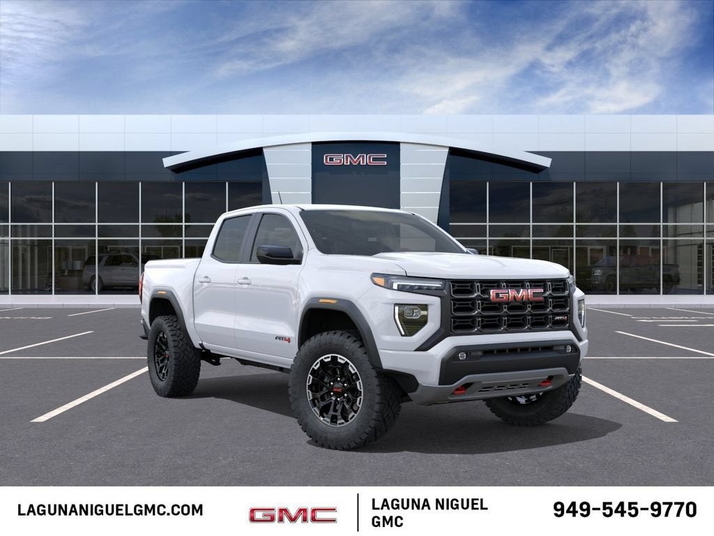 2026 GMC Canyon AT4 in Summit White — front three-quarter view