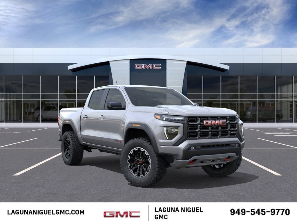 2026 GMC Canyon AT4 in Sterling Metallic — front three-quarter view