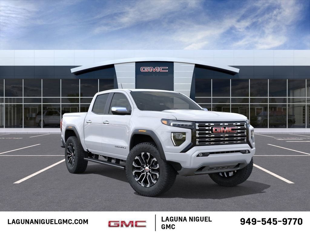 2026 GMC Canyon Denali in Summit White — front three-quarter view