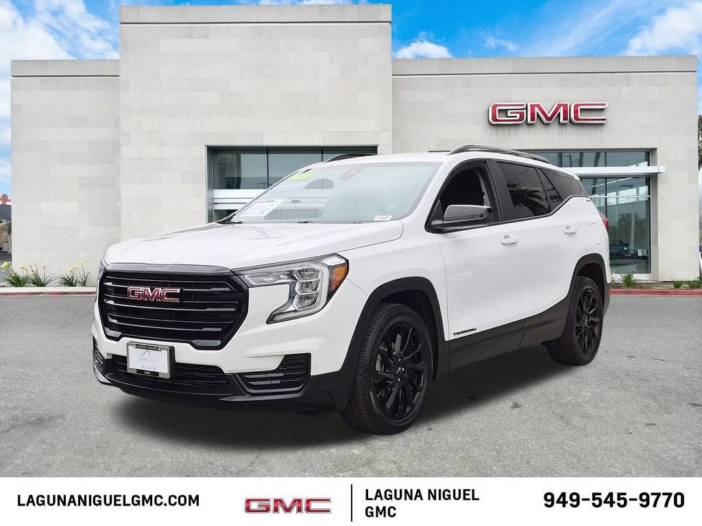 2023 GMC Terrain SLE in Summit White — front three-quarter view