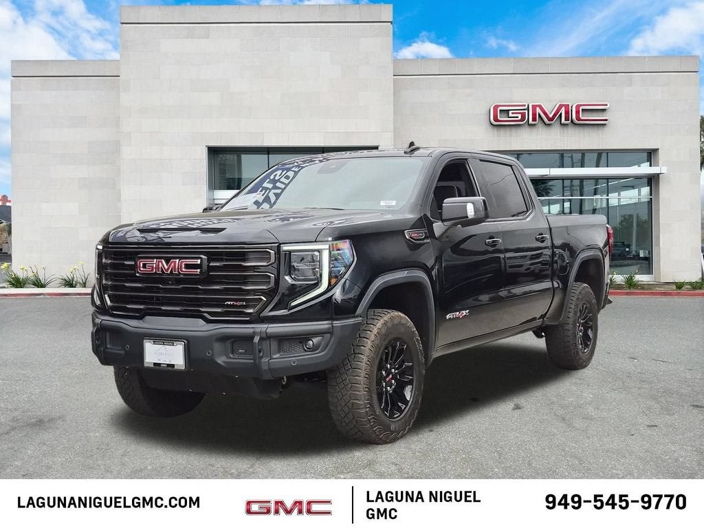 2023 GMC Sierra 1500 AT4X in Onyx Black — front three-quarter view