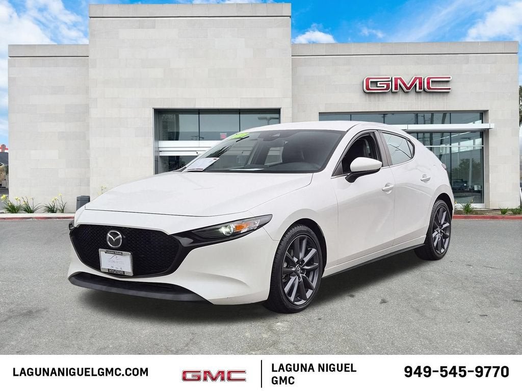 2021 Mazda Mazda3 Hatchback Select in White — front three-quarter view